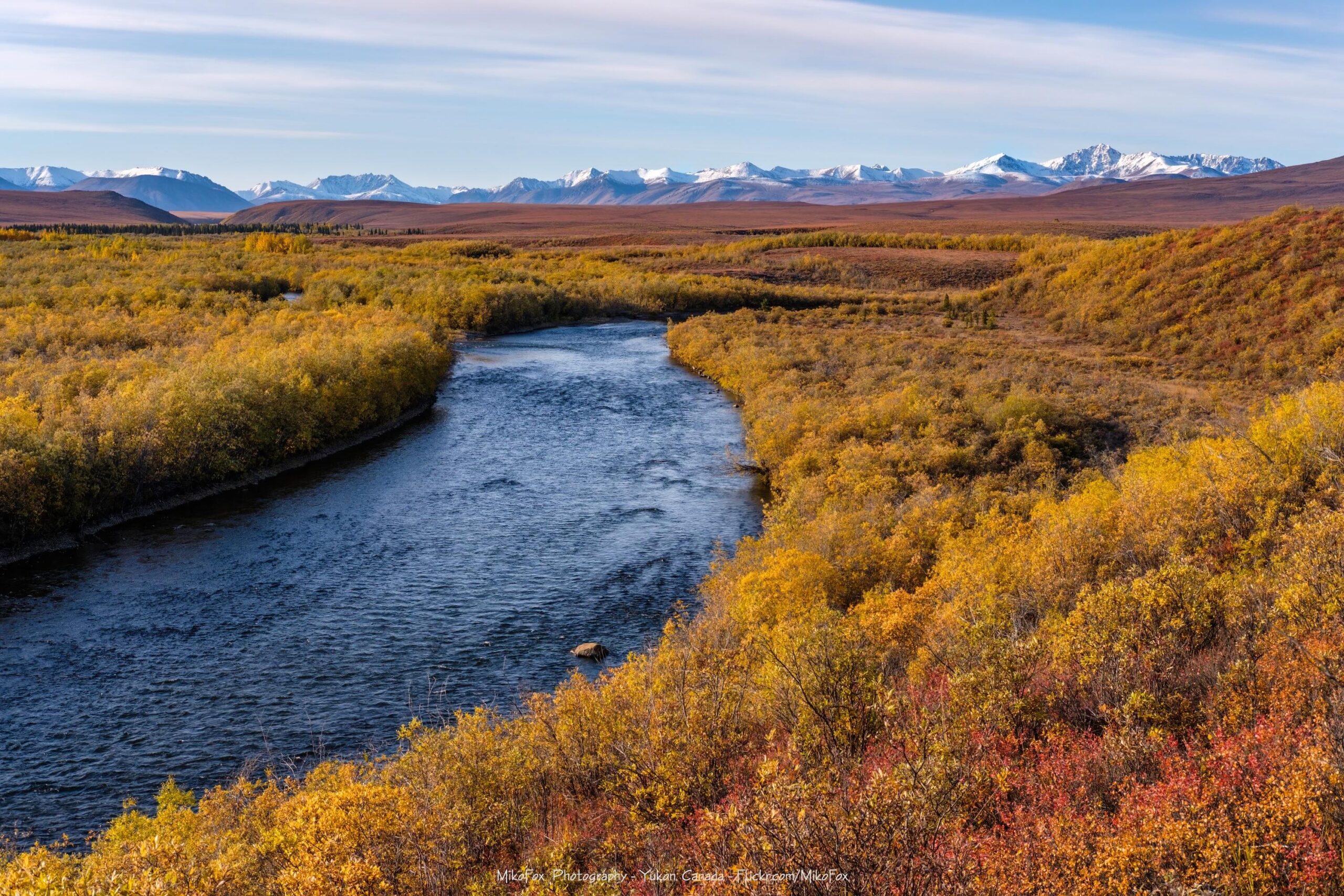 East Blackstone-rivier in Yukon, Canada. Terwijl het land de afgelopen 75 jaar met 2° Celsius (3,6° Fahrenheit) is opgewarmd, is het noorden met 2,6° C opgewarmd. Afbeelding door MikoFox via Flickr (CC BY-NC-SA 2.0).